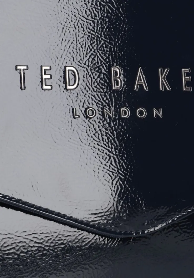 blauwe ted baker clutch crinkie