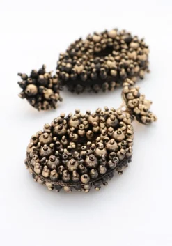 bronskleurig notre-v oorbellen earring beads