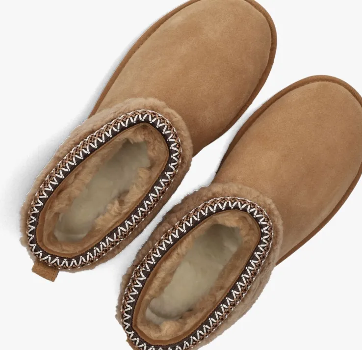 cognac ugg vachtlaarzen classic ultra mini maxi curly