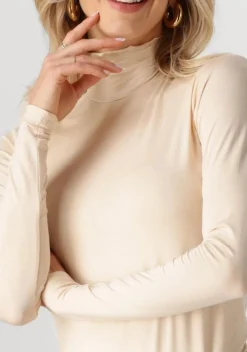 ecru cc heart coltrui cc heart sofia turtleneck blouse