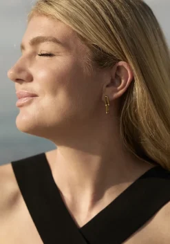 goudkleurig omoda atelier oorbellen earrings x iris