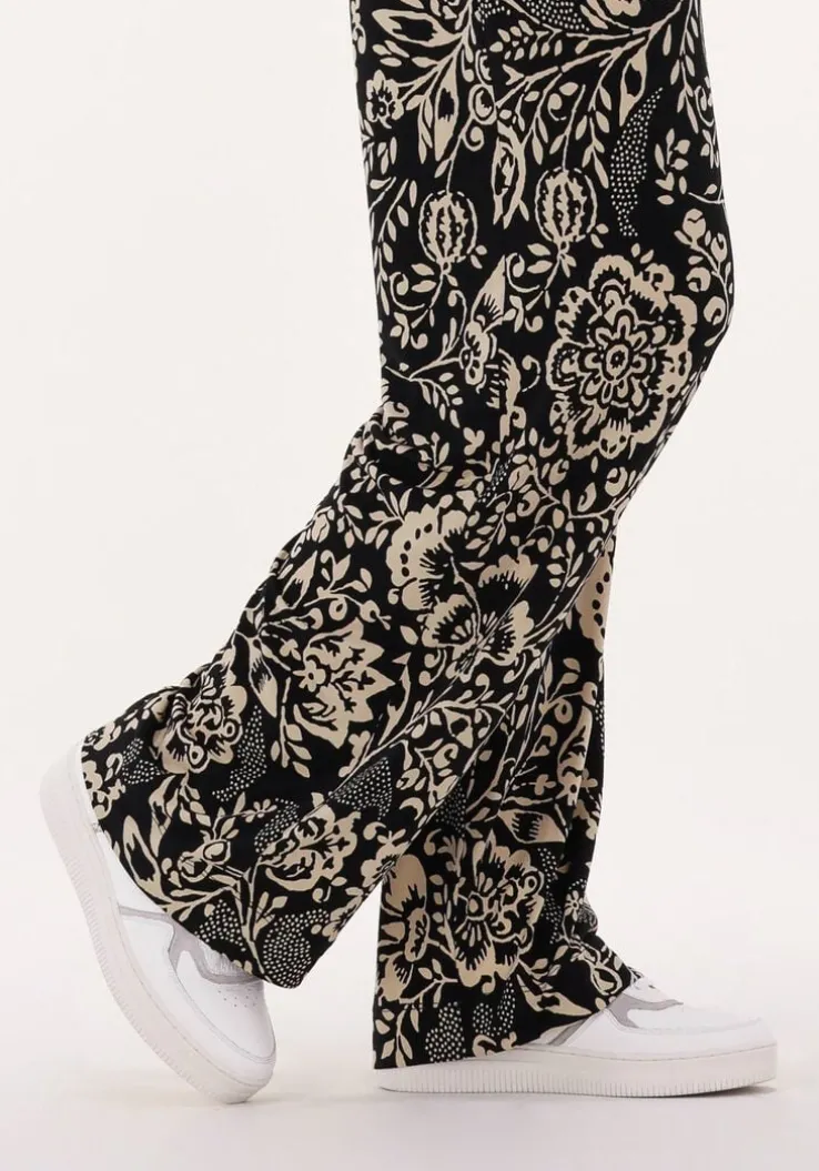 witte maruti lage sneakers momo