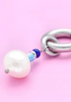 zilverkleurig notre-v oorbellen ss23 earring new collection