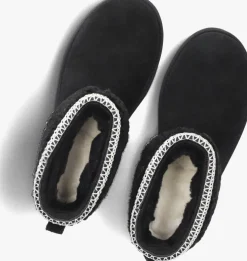 zwarte ugg vachtlaarzen classic ultra mini maxi curly